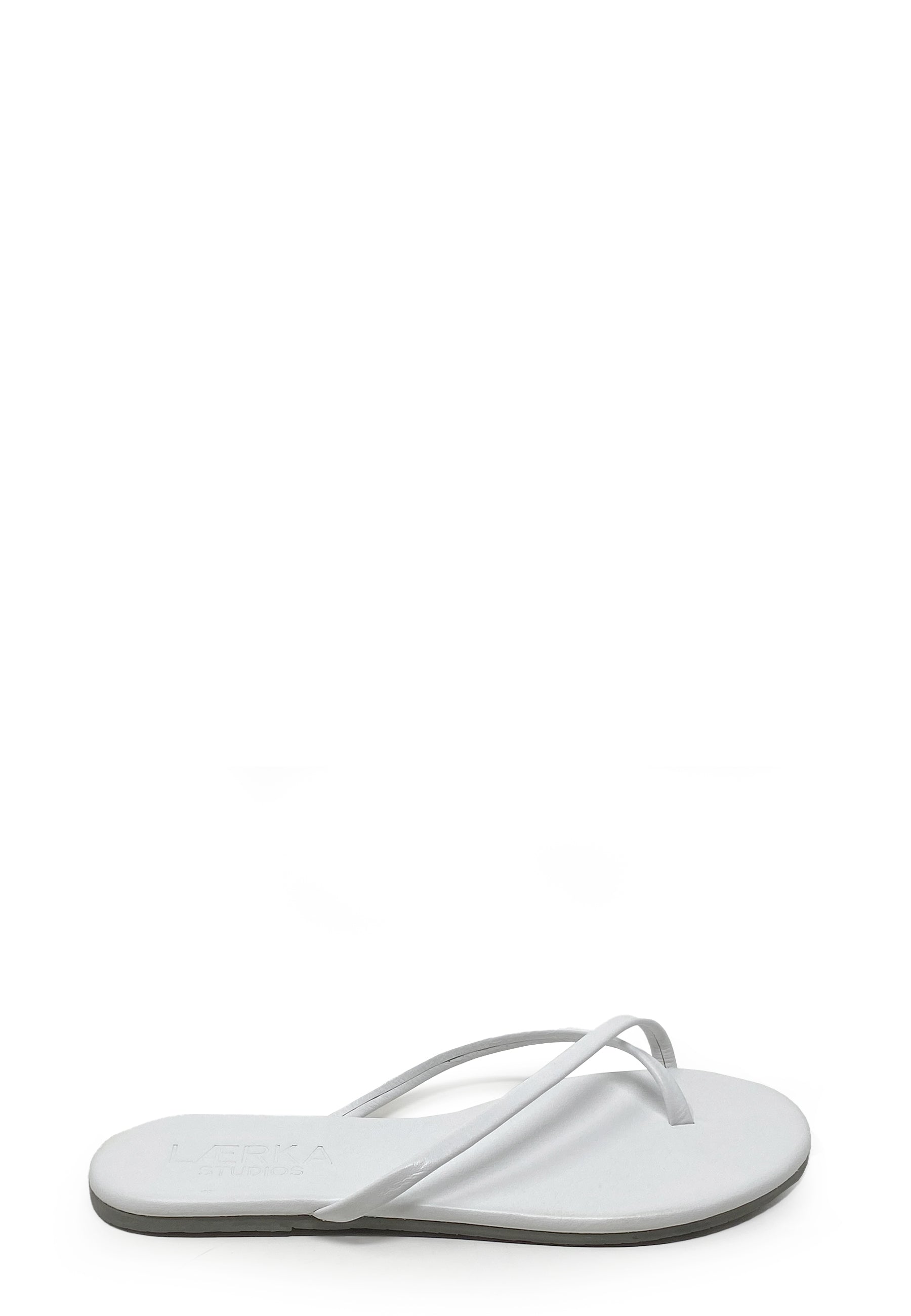 String toe separator mules | White